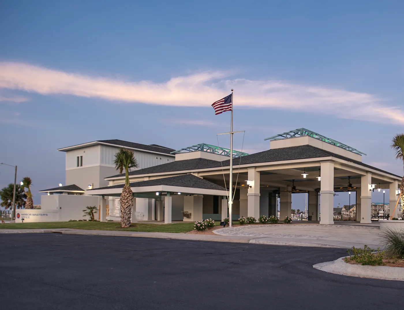 Harbor building on the Port Aransas waterfront at dusk, painted by Aldana Painting Co