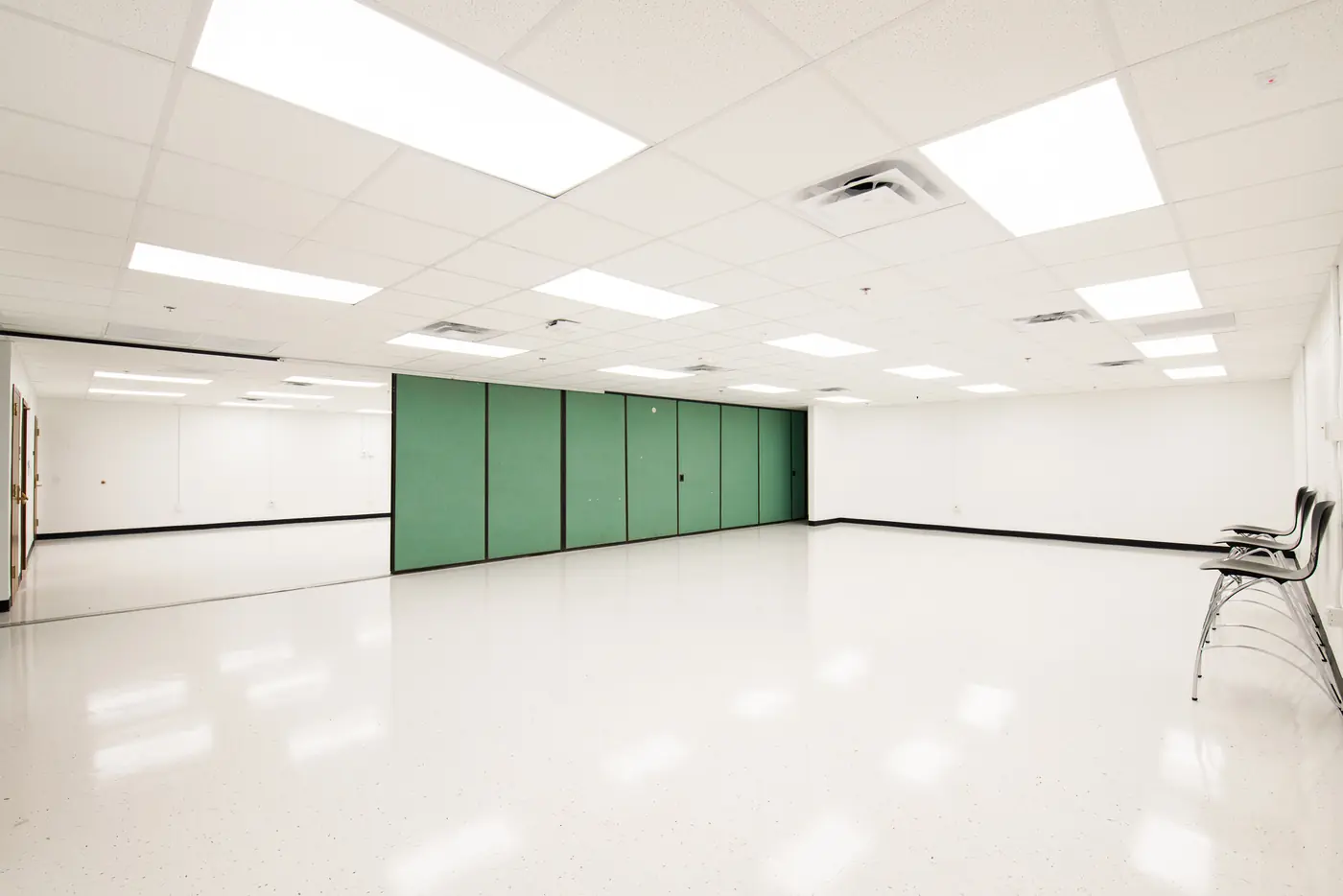 Bright, smooth white walls in a finished civic building interior